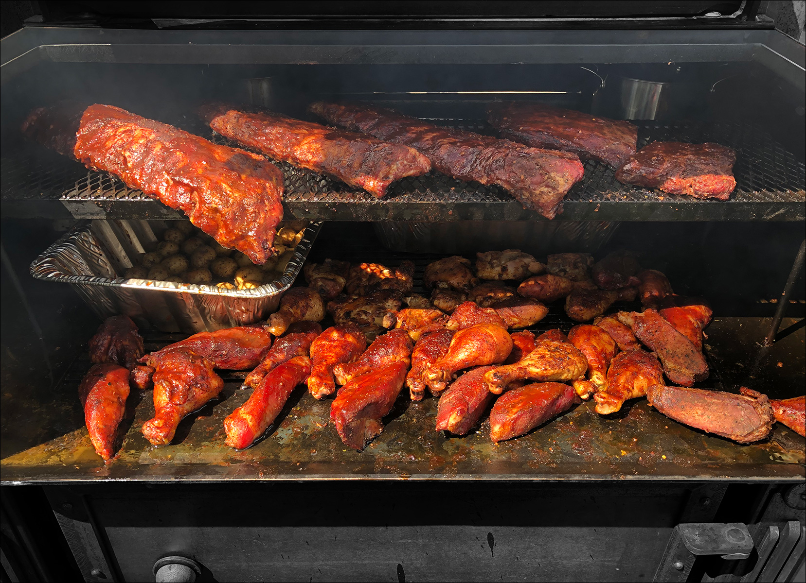 Ribs and Drumsticks on a Peacemaker Grill Andrew Parent